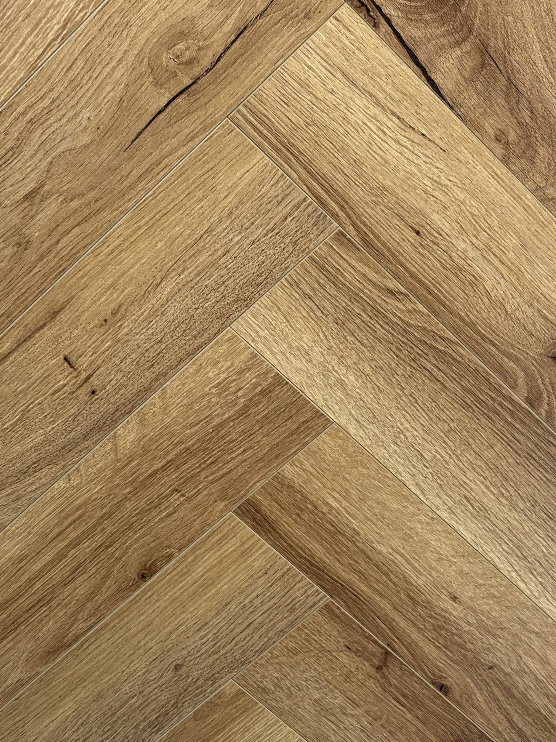 Heritage Herringbone 12mm Laminate Flooring - Image 11